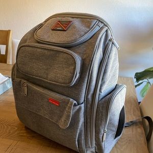 Bag Nation gray diaper bag backpack with stroller straps